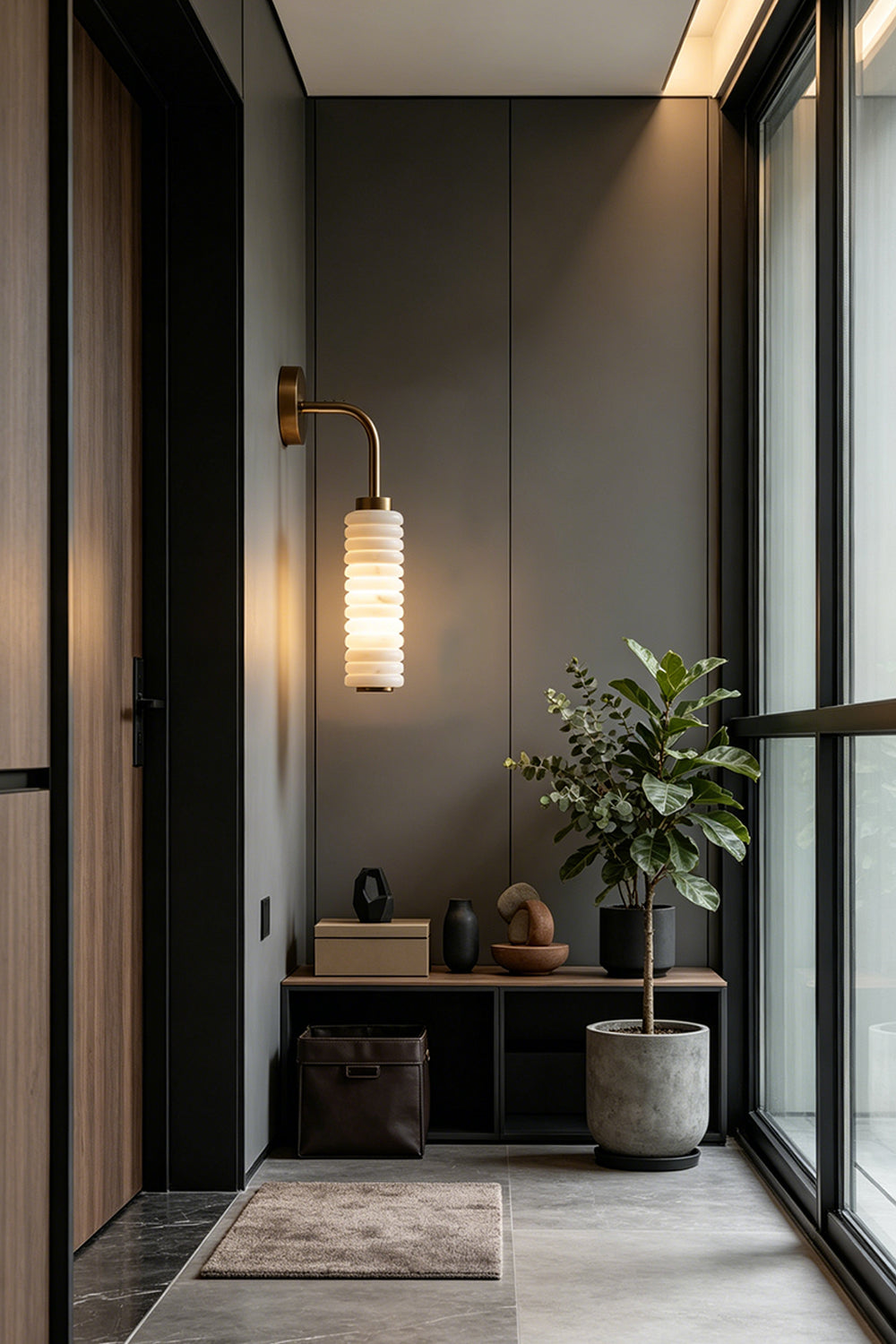 Stacked Strata Alabaster Wall Lamp | Metal, Alabaster | Lit lamp in minimal dining and console area | Samu Lamp