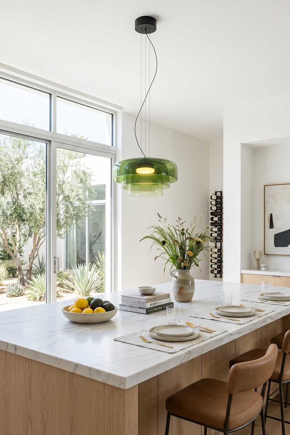 Stratum Layered Glass Pendant Light | Glass, Metal | Vibrant green variant illuminating a bright white marble kitchen countertop and dining area | Samu Lamp