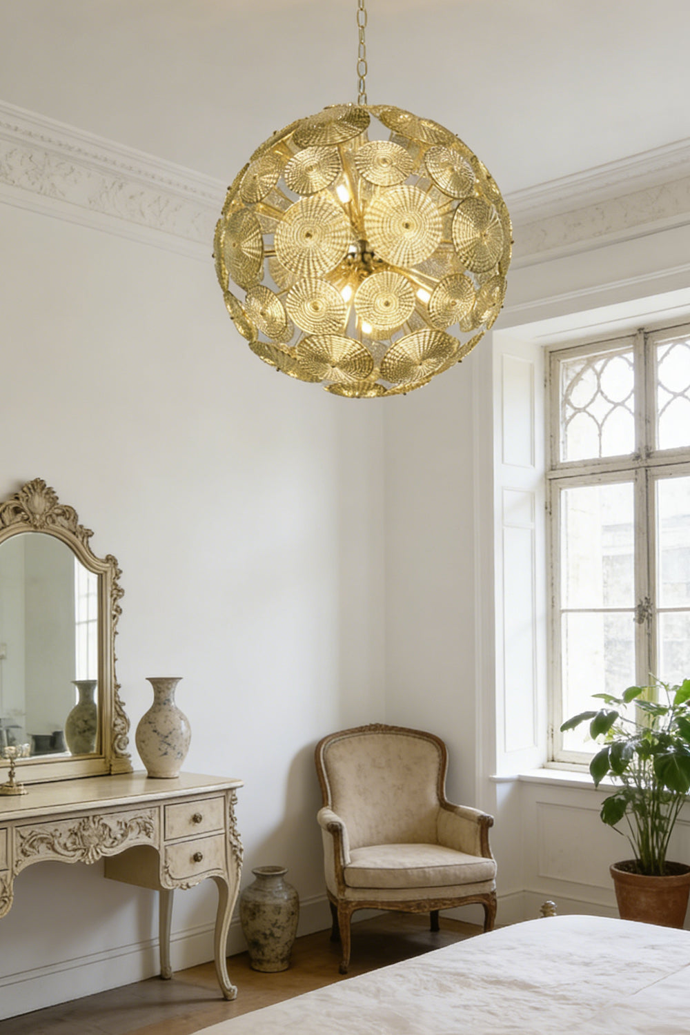 Lit spherical glass disc chandelier | Metal, Glass | Installed in a sunlit living room corner | Samu Lighting