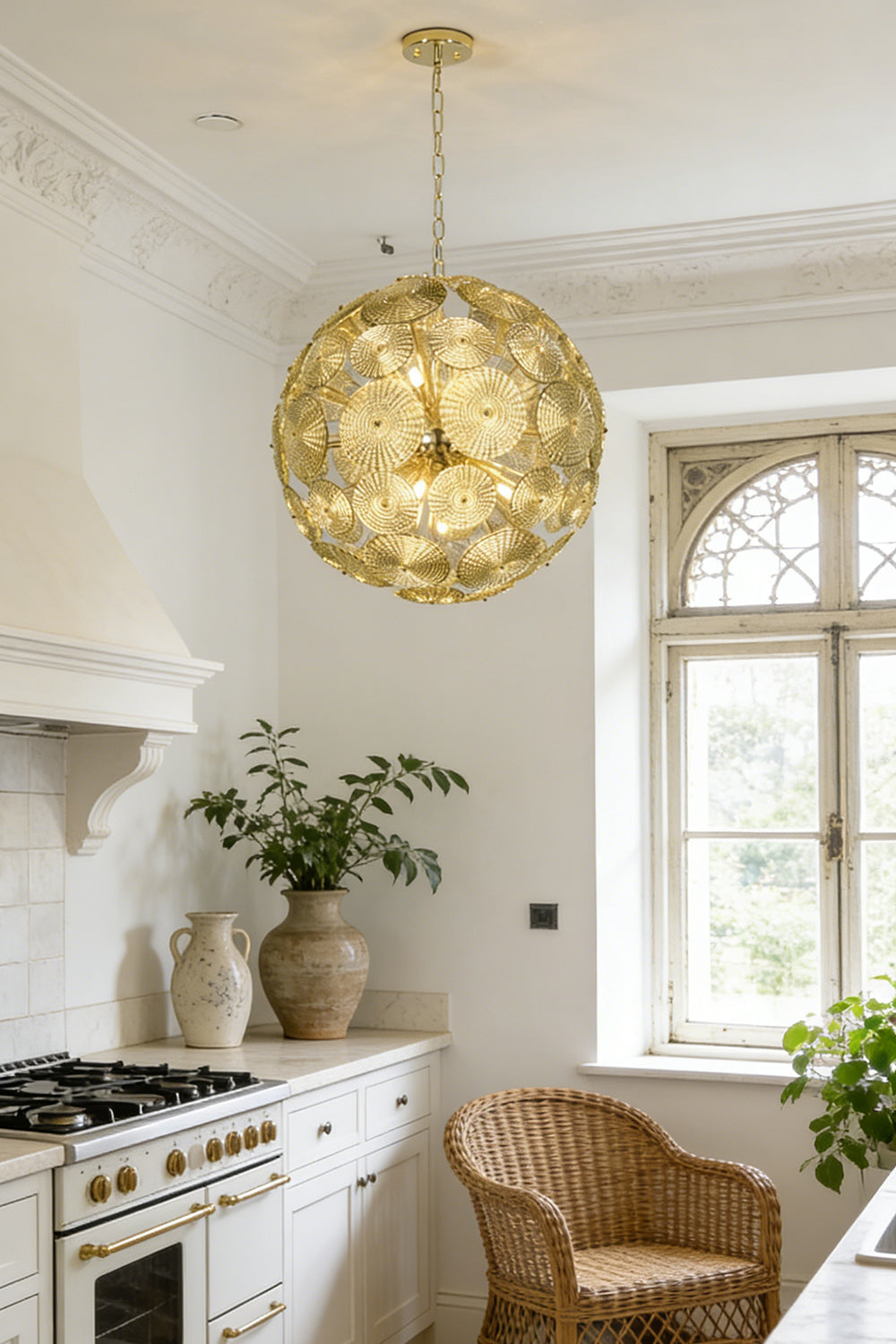 Lit spheres modern classic glass lamp | Metal, Glass | Installed in a bright kitchen over a marble counter | Samu Lighting