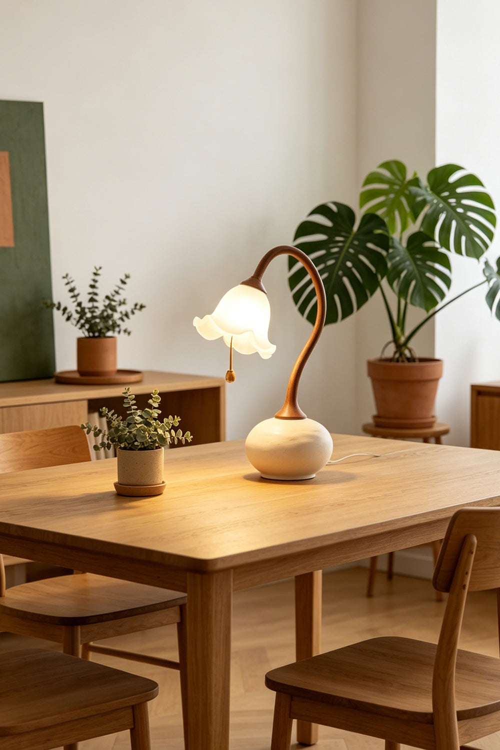 Sylva Bloom wood lamp on a large wooden work table | Resin, Glass | Samu Lamp