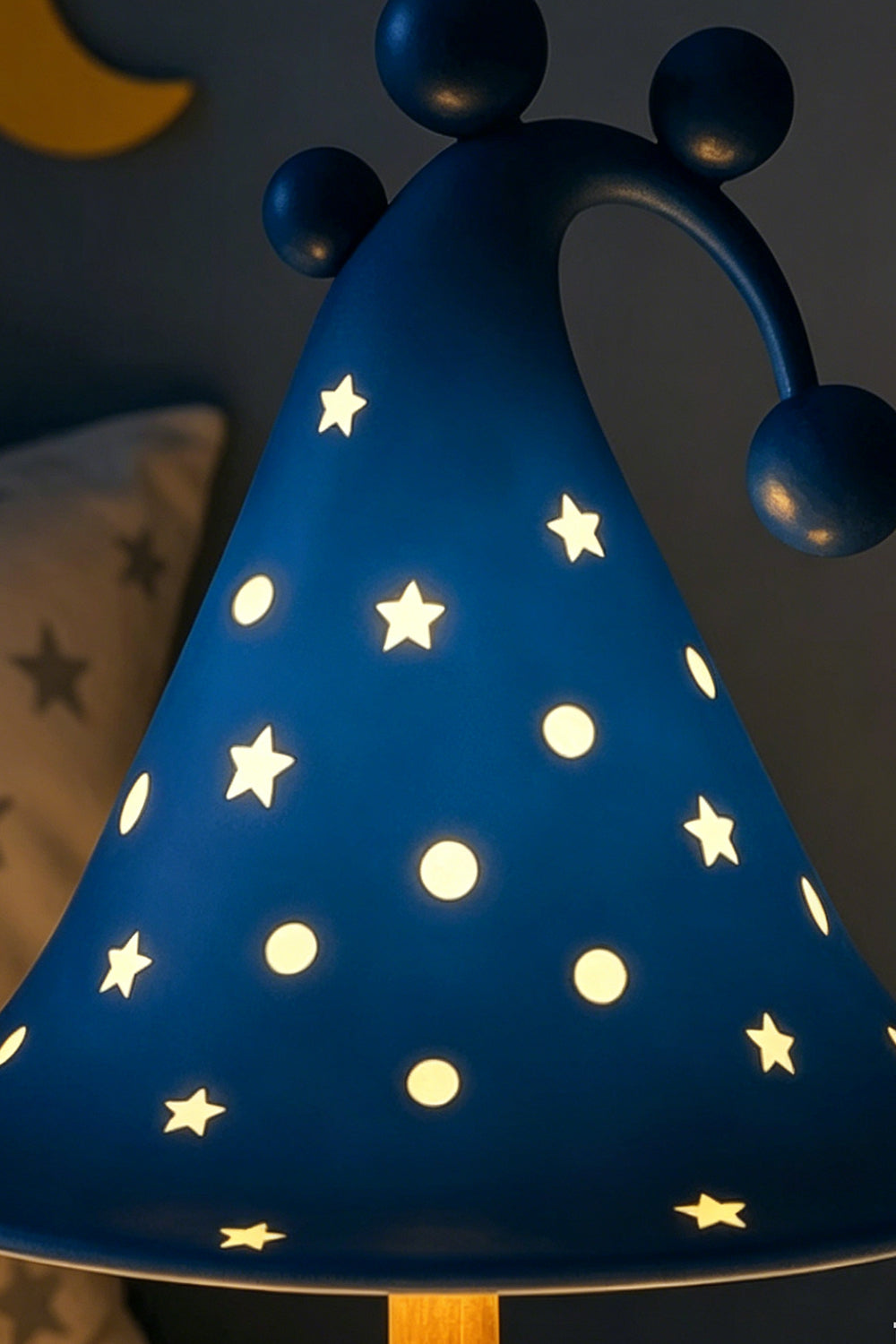 Sylvan Astral Resin Table Lamp |  star pattern shade | Lit close-up | Detail of glowing stars | Resin material texture | Samu Lamp