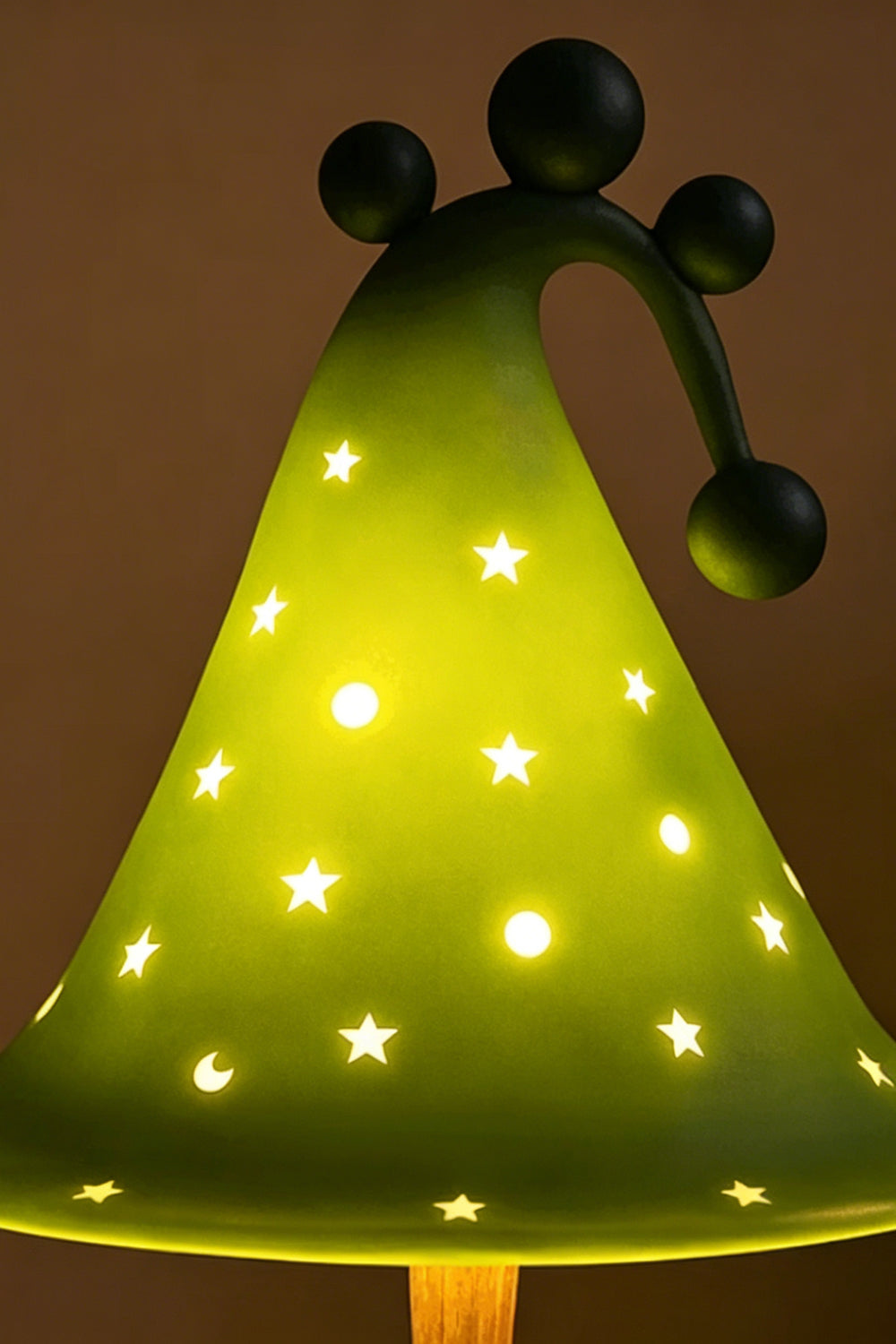Sylvan Astral Resin Table Lamp |  star pattern shade | Lit close-up | Detail of glowing stars | Resin material texture | Samu Lamp