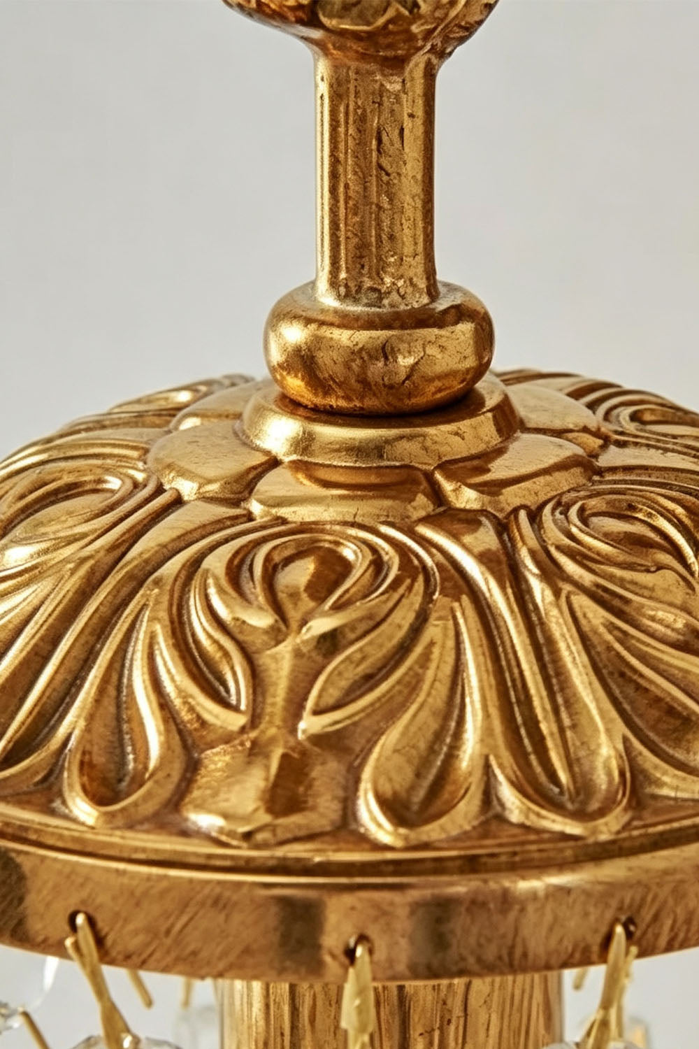 Close-up view of the ornate design on the Sylvestre Cast Brass Stag Wall Sconce, showcasing its intricate detailing and finish.