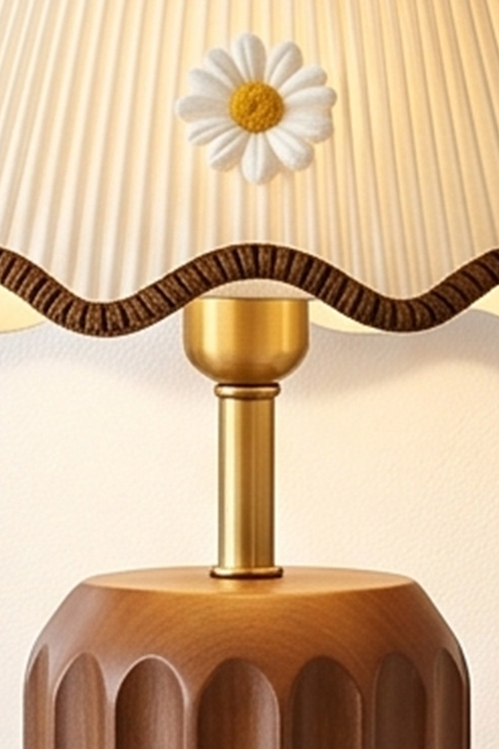 Tallulah Ribbed Wood Table Lamp | Wood, Fabric, Brass | Close-up view highlighting the brass neck and the pleated wavy shade detailed with an embroidered daisy flower | Samu Lamp