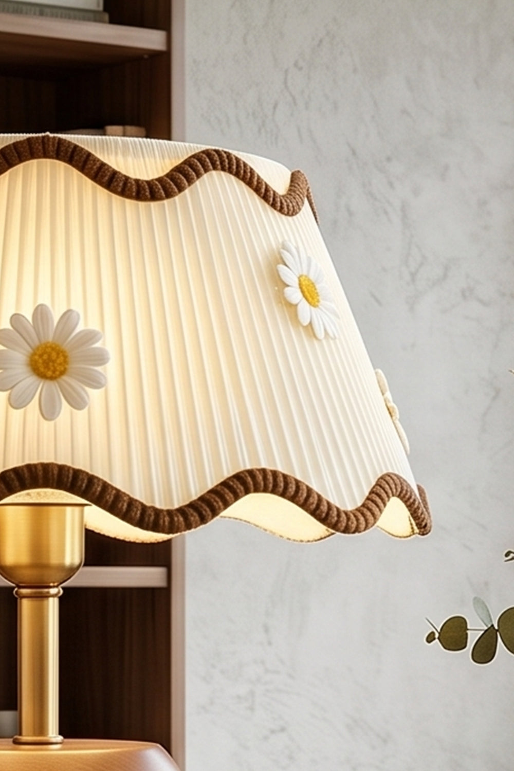 Tallulah Ribbed Wood Table Lamp | Wood, Fabric, Brass | Angled view showcasing the scalloped edge and daisy decoration of the shade against a textured neutral wall | Samu Lamp