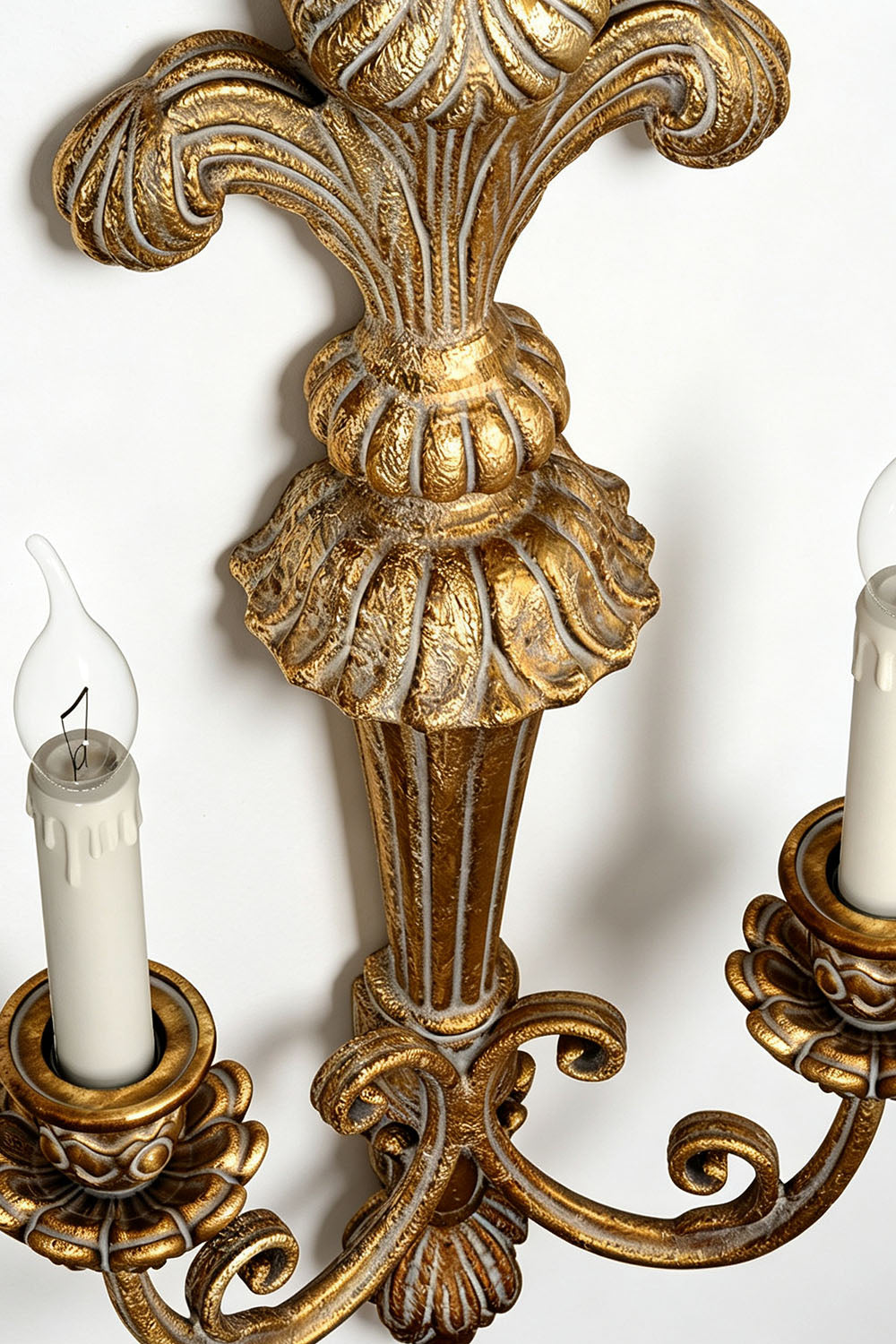 Tamsin Carved Plume Candle Wall Lamp | Carved Resin and Brass | Detail shot highlighting the antique gold leaf finish and carved textures | Samu Lamp