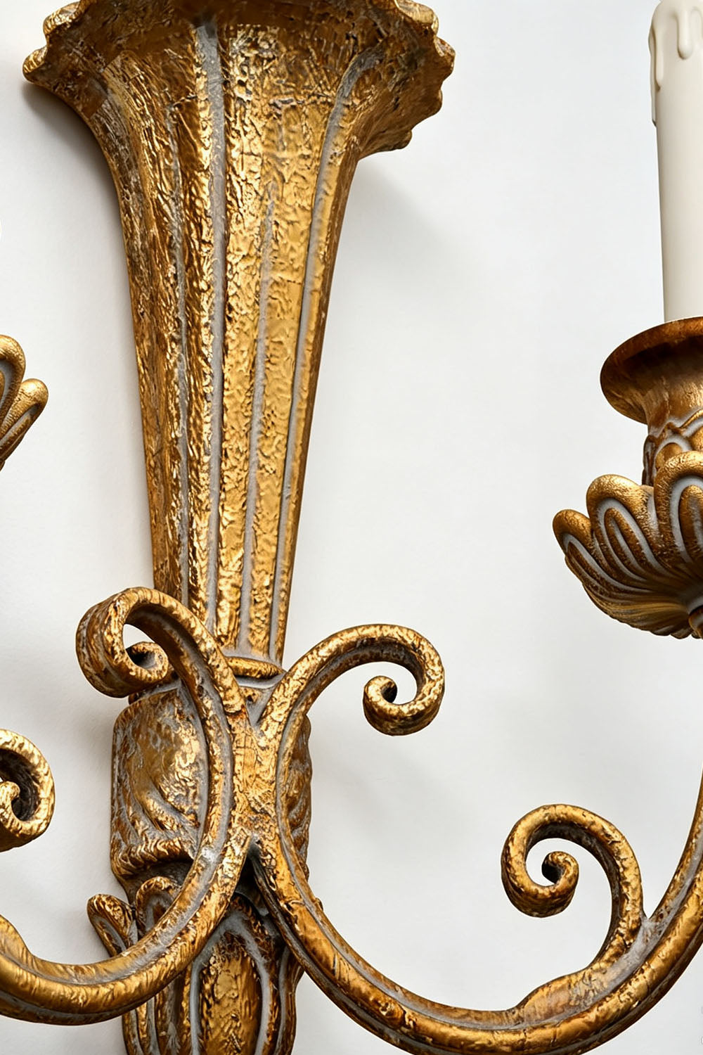 Tamsin Carved Plume Candle Wall Lamp | Carved Resin and Brass | Close-up detail of the main carved column and twin curved sconce arms | Samu Lamp