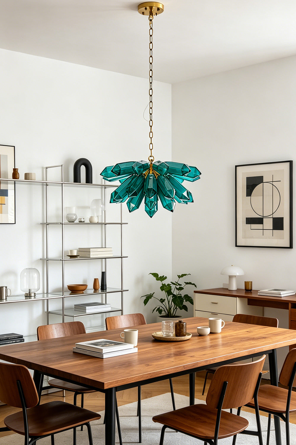 Artistic teal crystal cluster pendant light | Metal | Glass | Hanging over a wooden dining table with leather chairs | Samu Lamp
