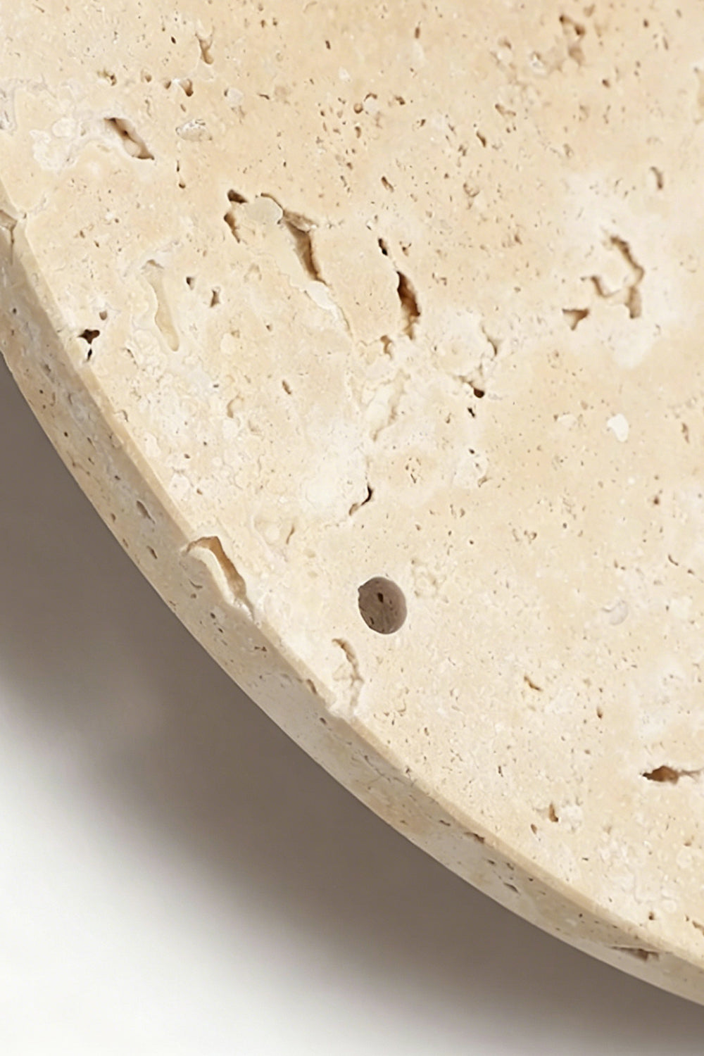 Temporal Epoch Material Detail | Travertine | Macro shot of the porous natural stone edge and texture | Samu Lamp