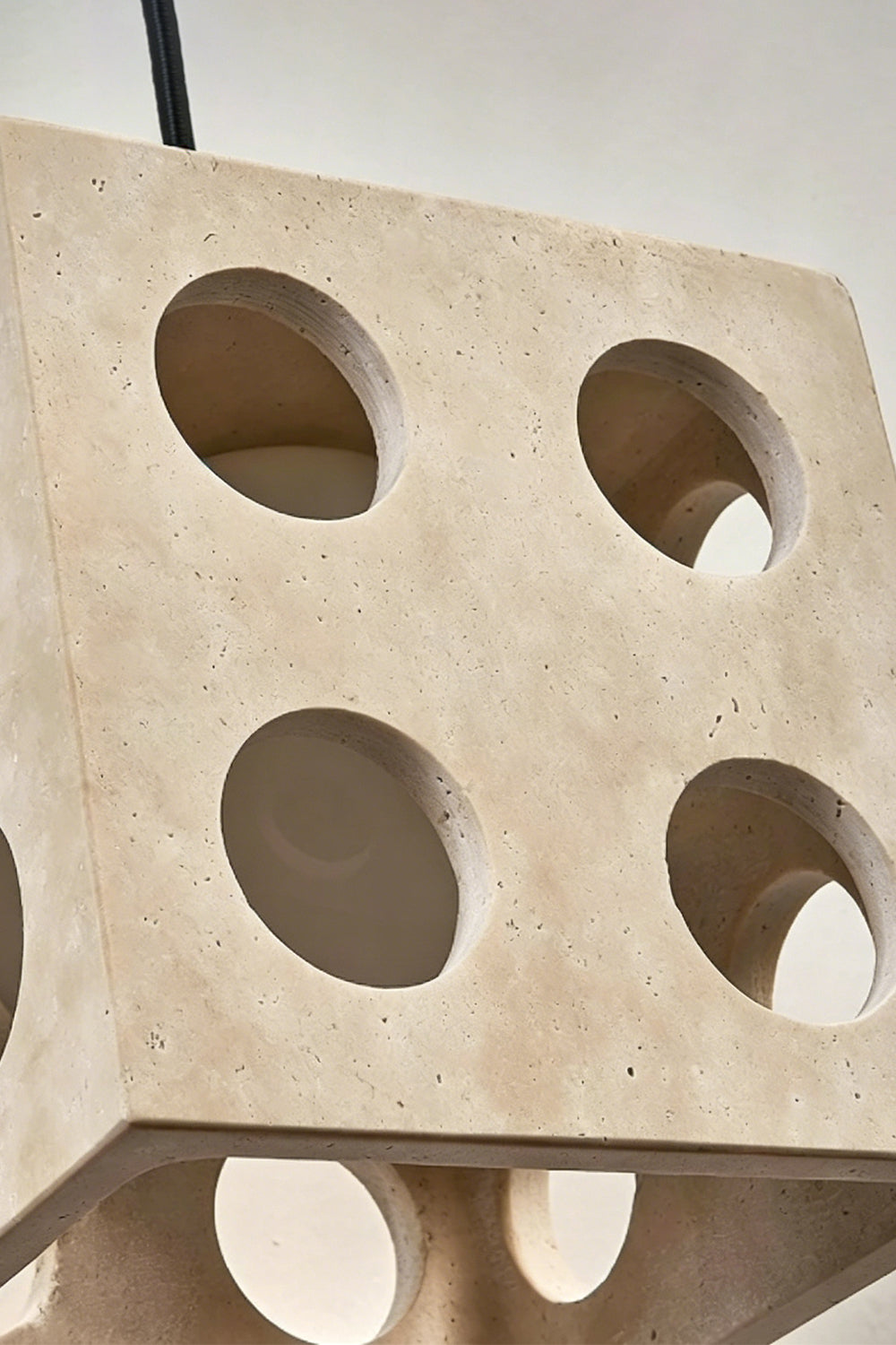 Terra Cube Travertine Pendant Light | Travertine, Metal | Close-up detail of unlit stone and hardware | Samu Lamp