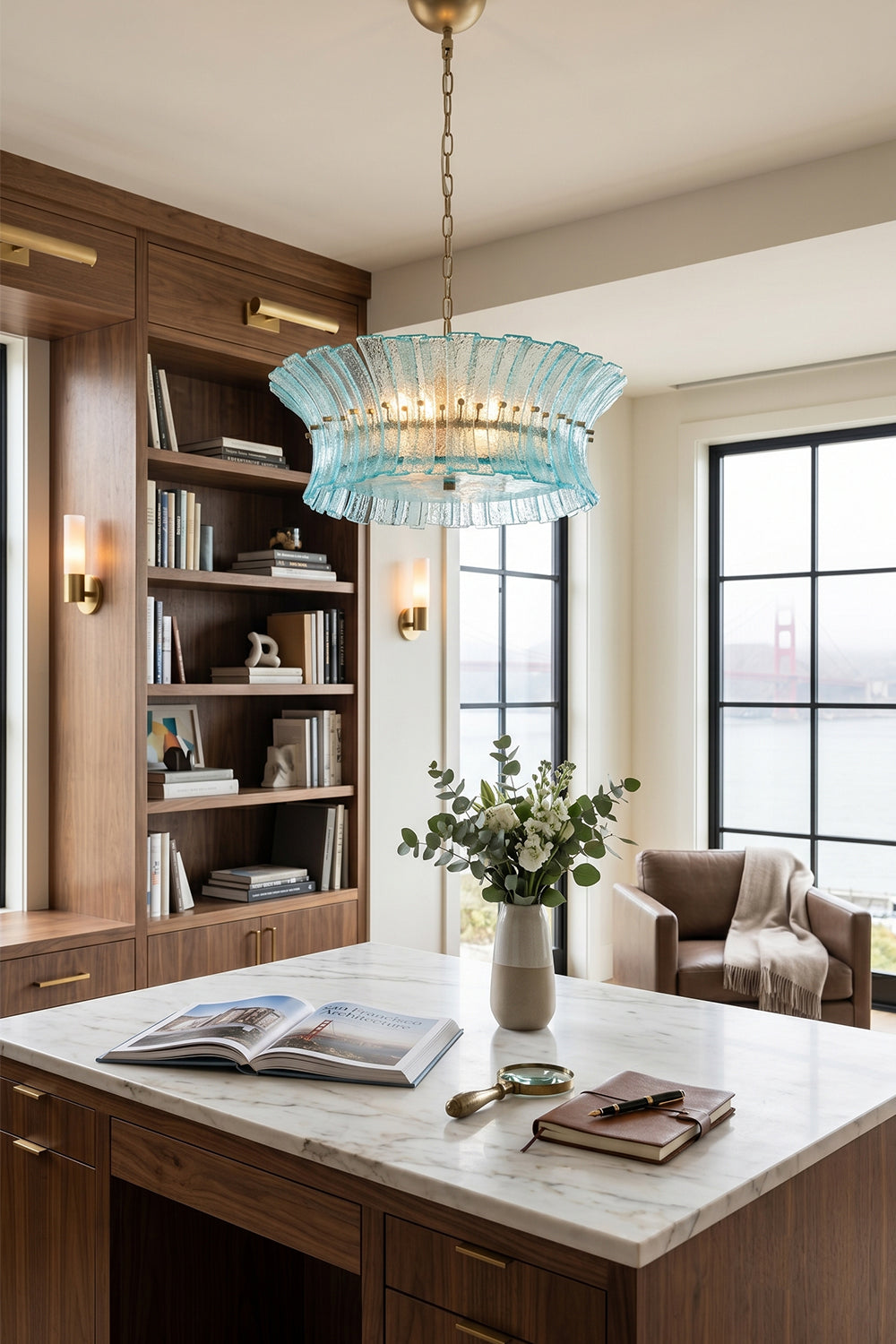 Thalassa Aquamarine Textured Glass Chandelier | Glass, Metal | Positioned as a luxury accent light fixture in a sophisticated home executive workspace featuring a large desk and built-in library shelves | Samu Lamp