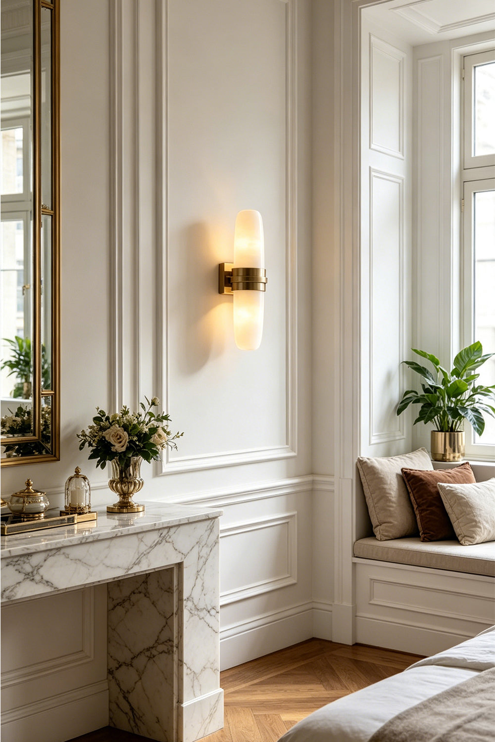 Theron Linear Alabaster Wall Lamp | Alabaster, Metal | Installed on a white paneled feature wall next to an elegant window seating alcove bench | Samu Lamp