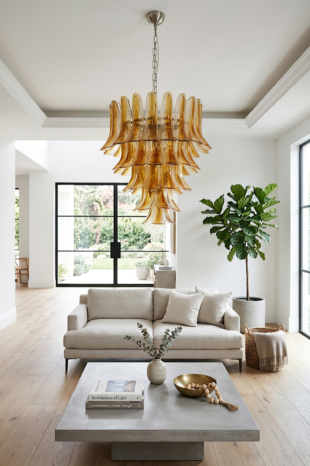 Modern amber lily glass pendant | Metal, Glass | Over a white sofa in a bright spacious lounge | Samu Lamp