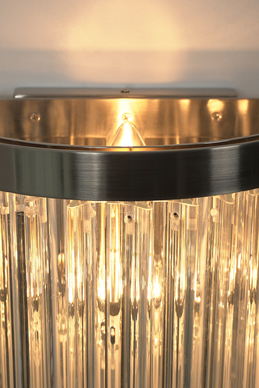 Angled close-up of lit glass rods | Metal, Glass | Detail view showing rod texture | Samu Lighting