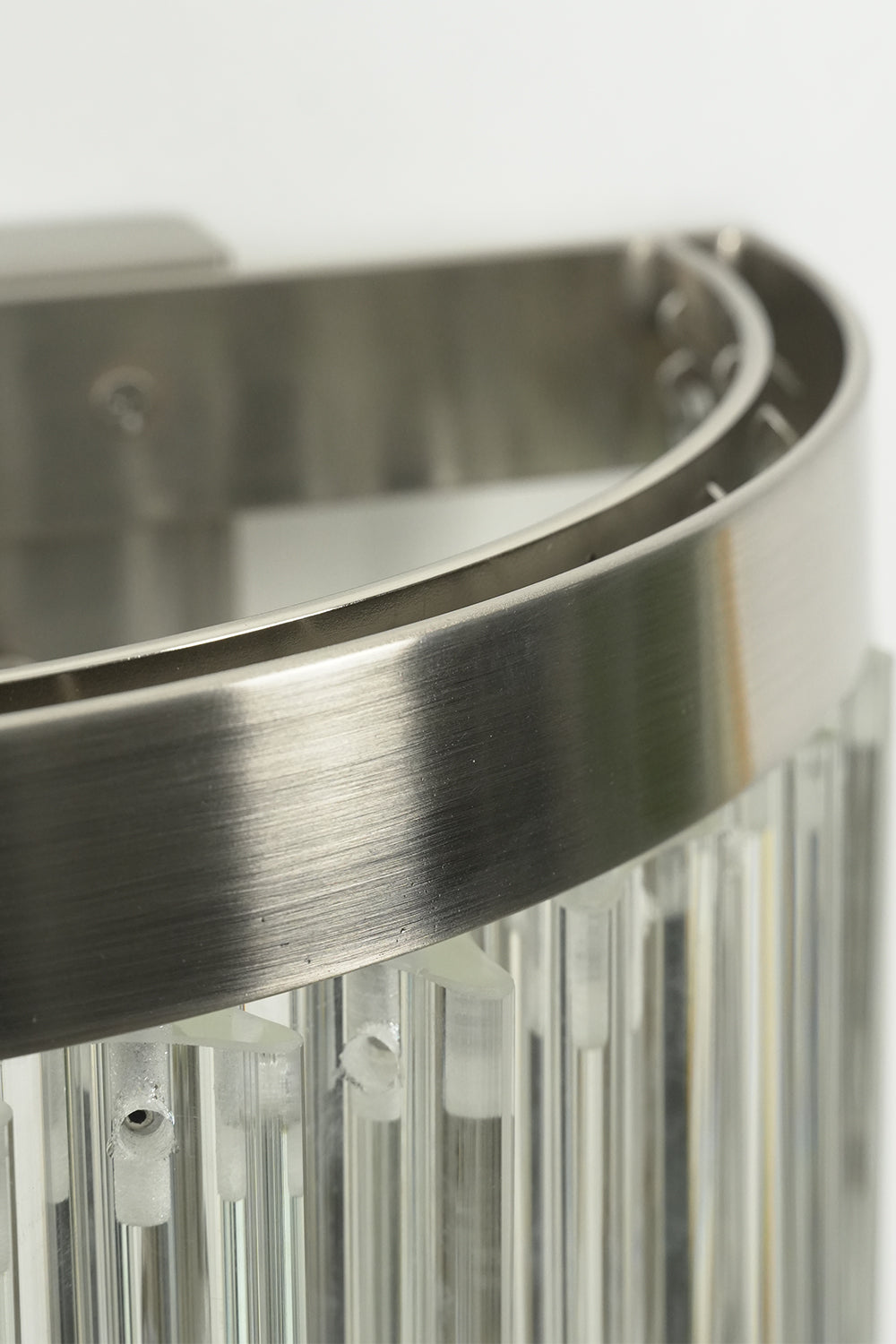 Angled close-up of unlit wall light top frame | Metal, Glass | Detail view of mounting and framework | Samu Lighting