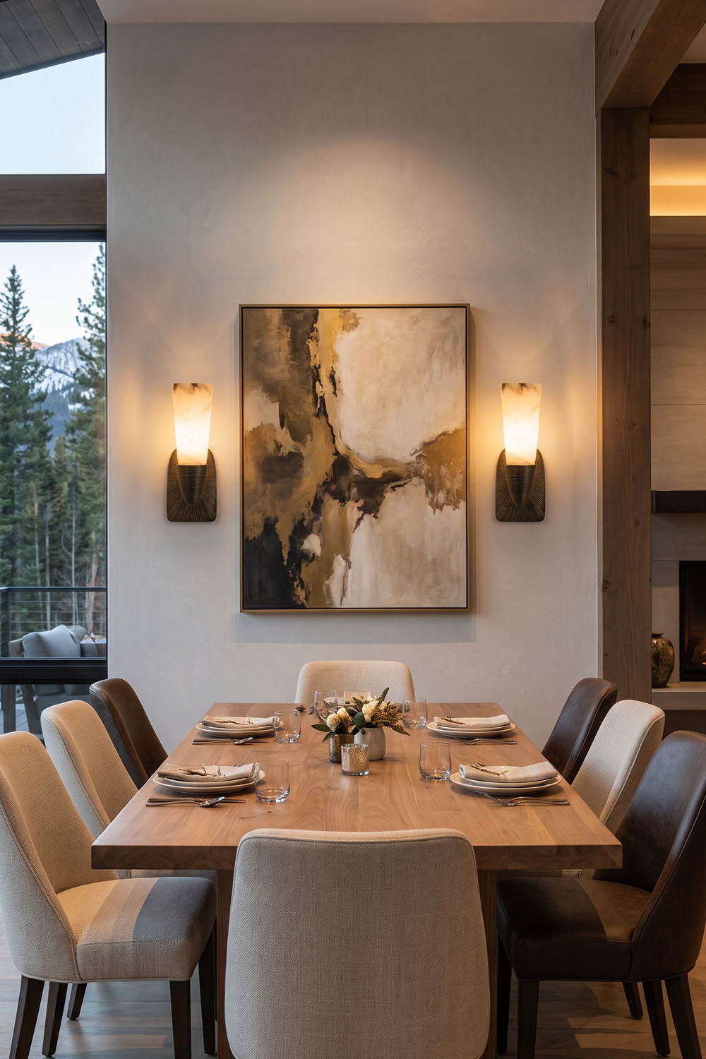 Torsanne Wall Sconce | Alabaster and Bronze | Symmetrical pair flanking abstract art in formal dining room | Samu Lamp