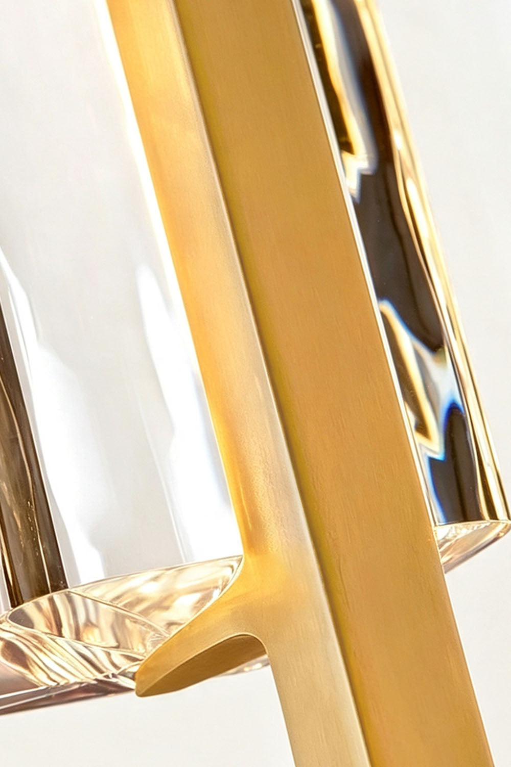 Close-up of the Torvald Crystal Bar Drop Pendant Light showcasing its elegant gold accent and crystal design.