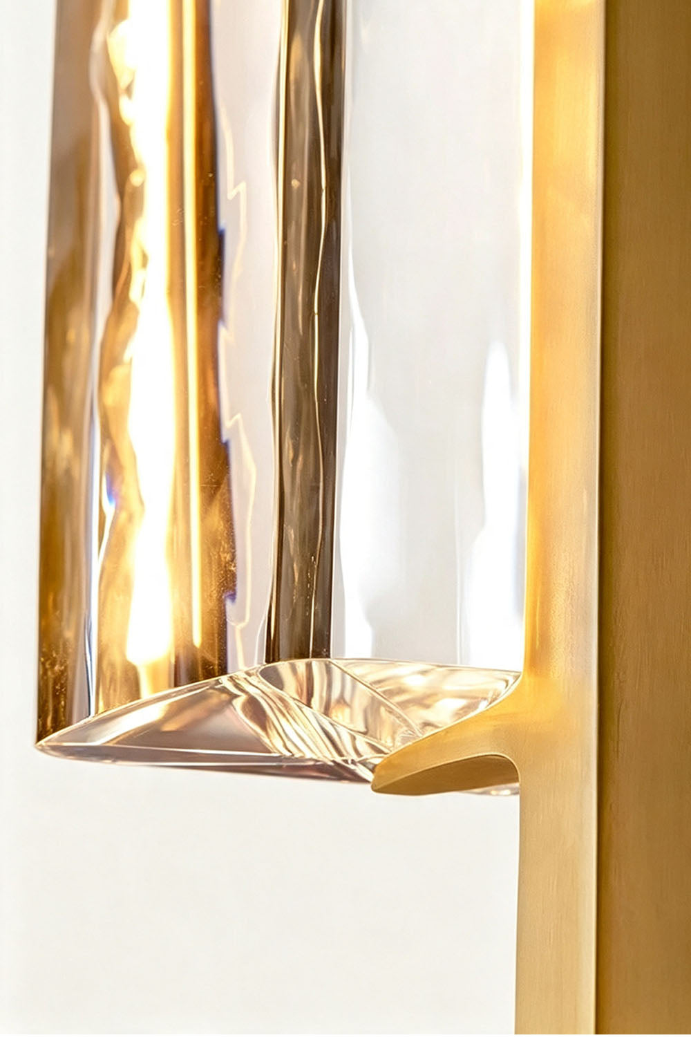 Close-up of the Torvald Crystal Bar Drop Pendant Light showcasing its elegant crystal and gold design.