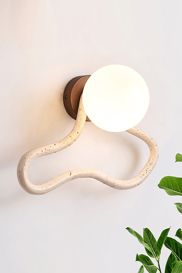 Side view of lit travertine flow wall light | Travertine, Glass, Wood | Showing the warm illumination through glass and stone | Samu Lamp