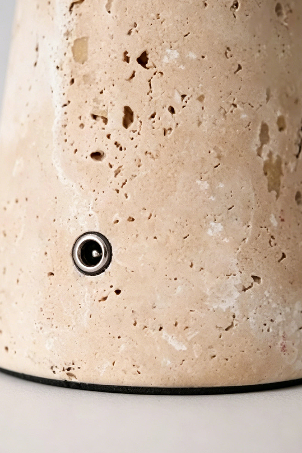 Travertine Obelisk Table Lamp detail | Travertine | Close-up of stone texture and charging port | Samu Lamp