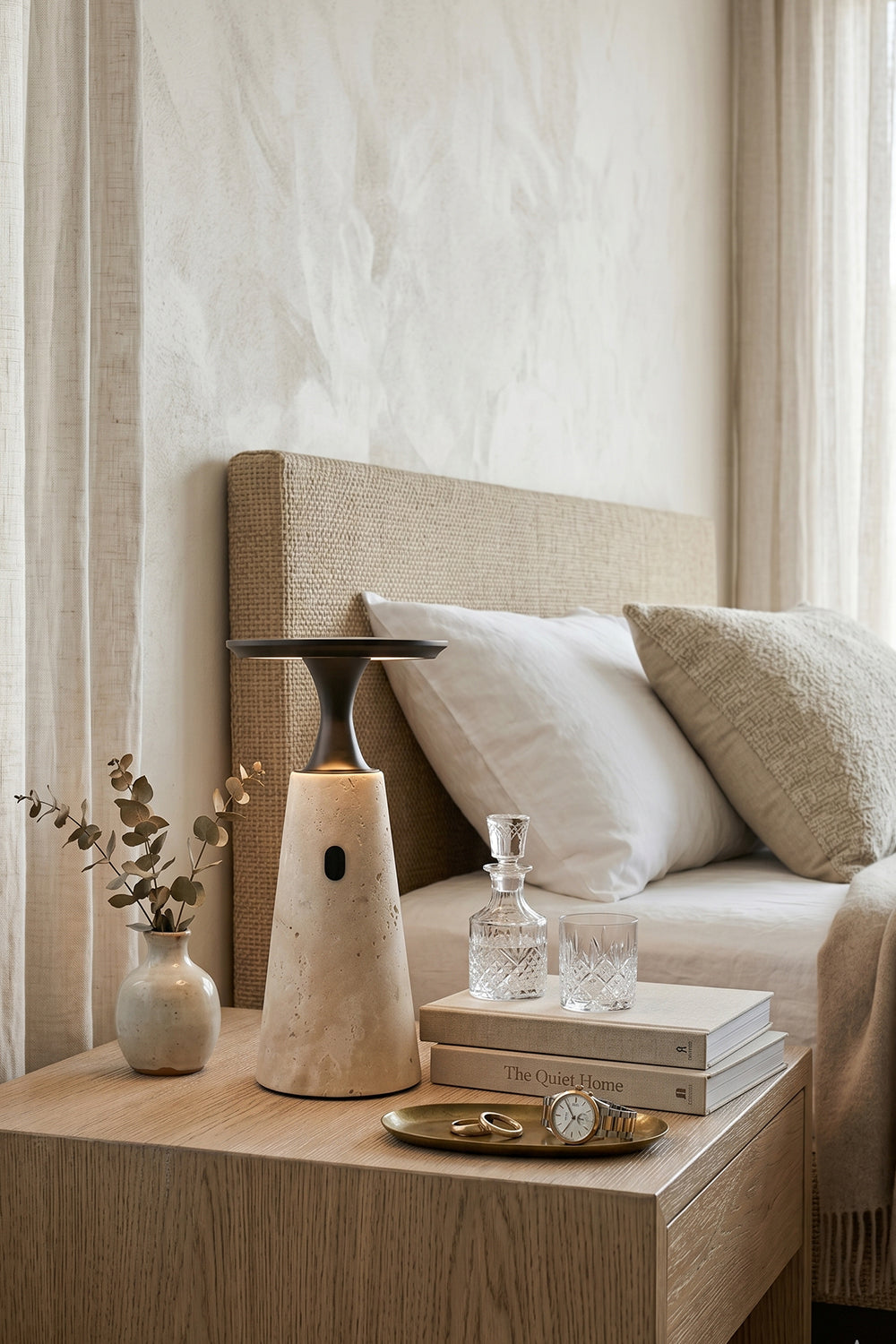 Travertine Obelisk Table Lamp | Metal, Travertine | Bedside lamp in neutral bedroom setting | Samu Lamp