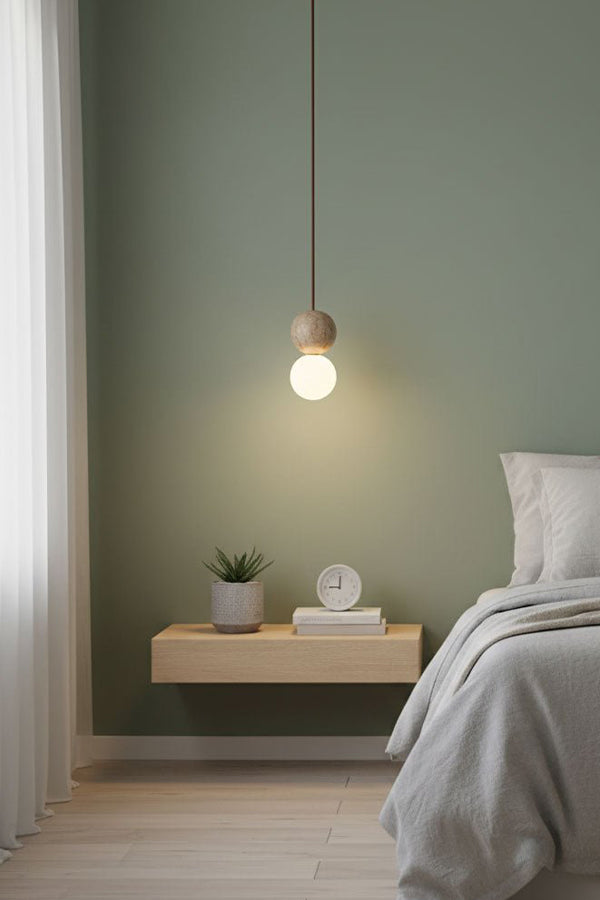 Single travertine stone pendant light | Yellow Travertine, Glass | Minimalist bedside installation in a bright room | Samu Lamp