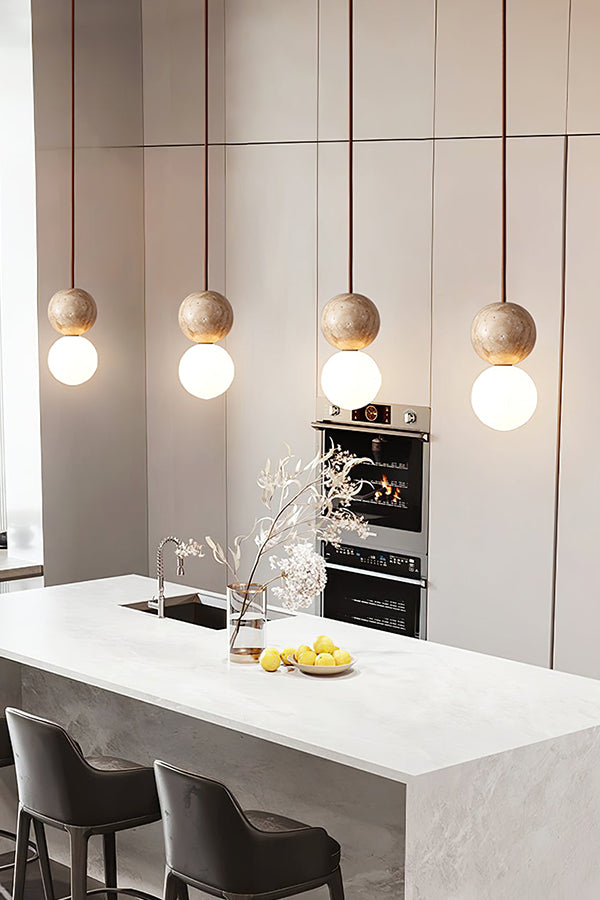 4-light linear travertine pendant light | Yellow Travertine, Glass | Kitchen island installation with sleek modern decor | Samu Lamp