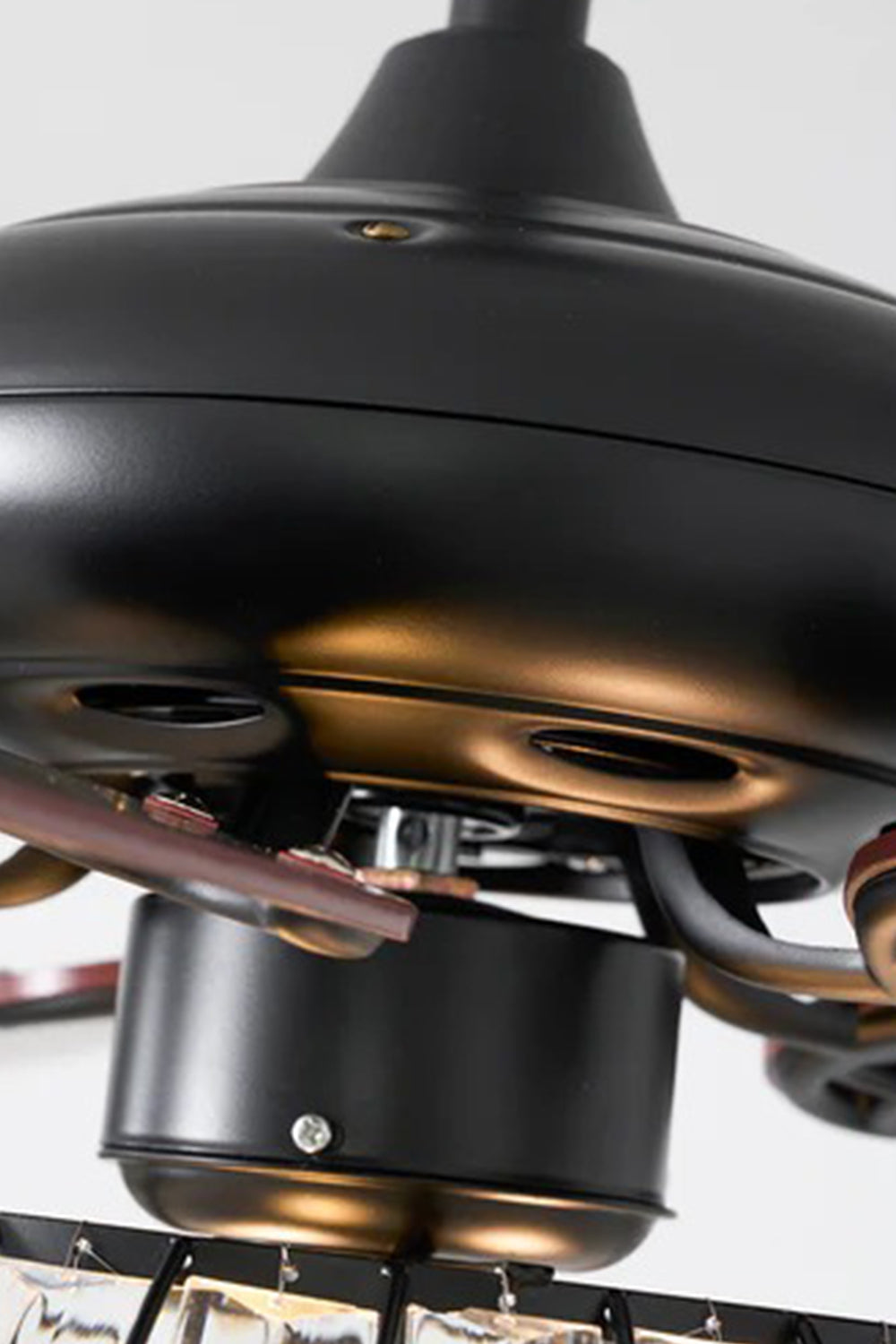 Valerius Luxury Crystal Ceiling Fan Light | Crystal, Metal, Wood | Macro close-up profile highlighting the sleek finish and contours of the matte black metallic motor housing | Detail shot | Samu Lamp