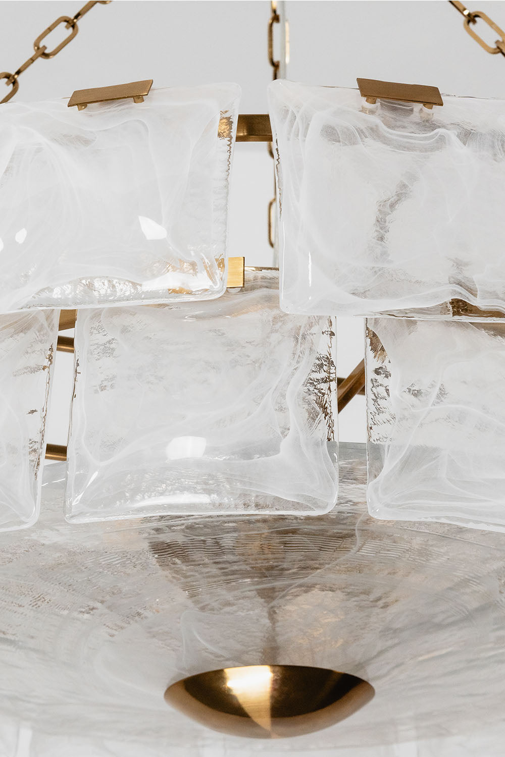 Verel Stepped Glass Drum Chandelier featuring elegant glass and brass detailing.