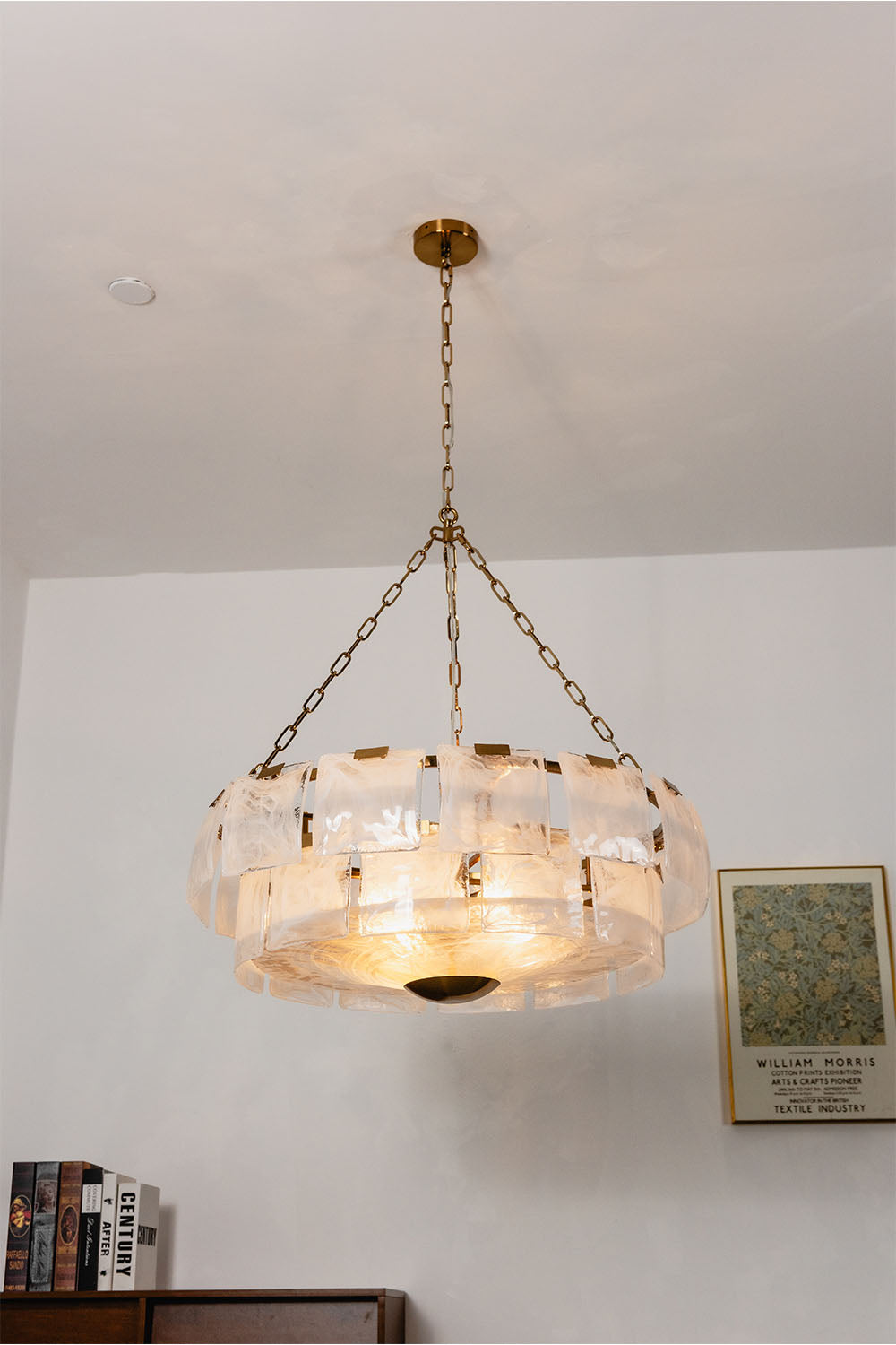 Verel Stepped Glass Drum Chandelier featuring a gold chain and elegant glass design.