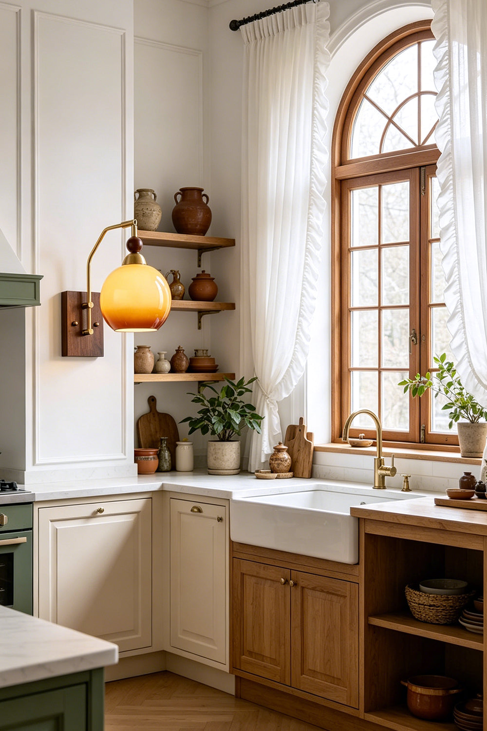 Vesper Caramel Gradient Wall Lamp | Glass, Metal, Wood | Wall-mounted near a bright arched window over a cozy rustic farmhouse kitchen counter with white cabinetry | Samu Lamp