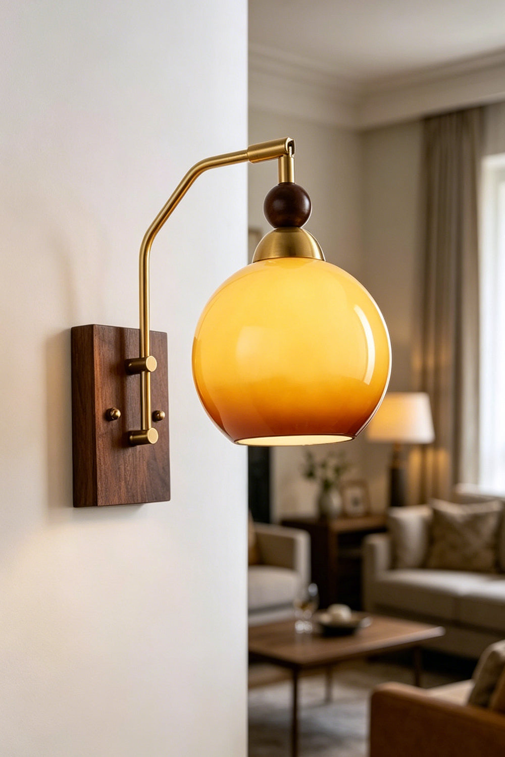 Vesper Caramel Gradient Wall Lamp | Glass, Metal, Wood | Mounted on a neutral corner column wall, casting a soft golden glow overlooking a modern classic lounge space | Samu Lamp