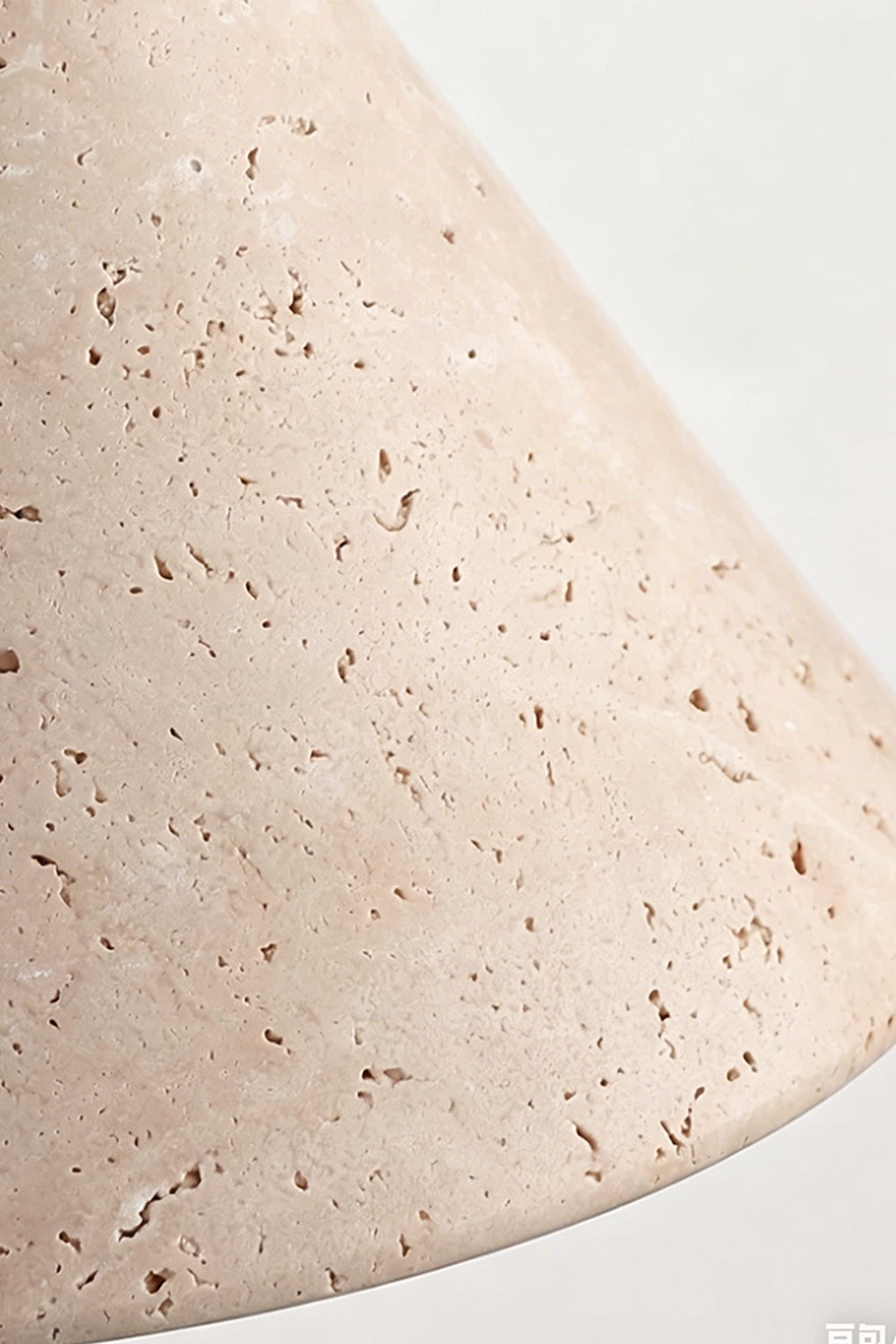 Vesper Cone Travertine Wall Light | Travertine | Macro shot of porous travertine stone texture | Samu Lamp