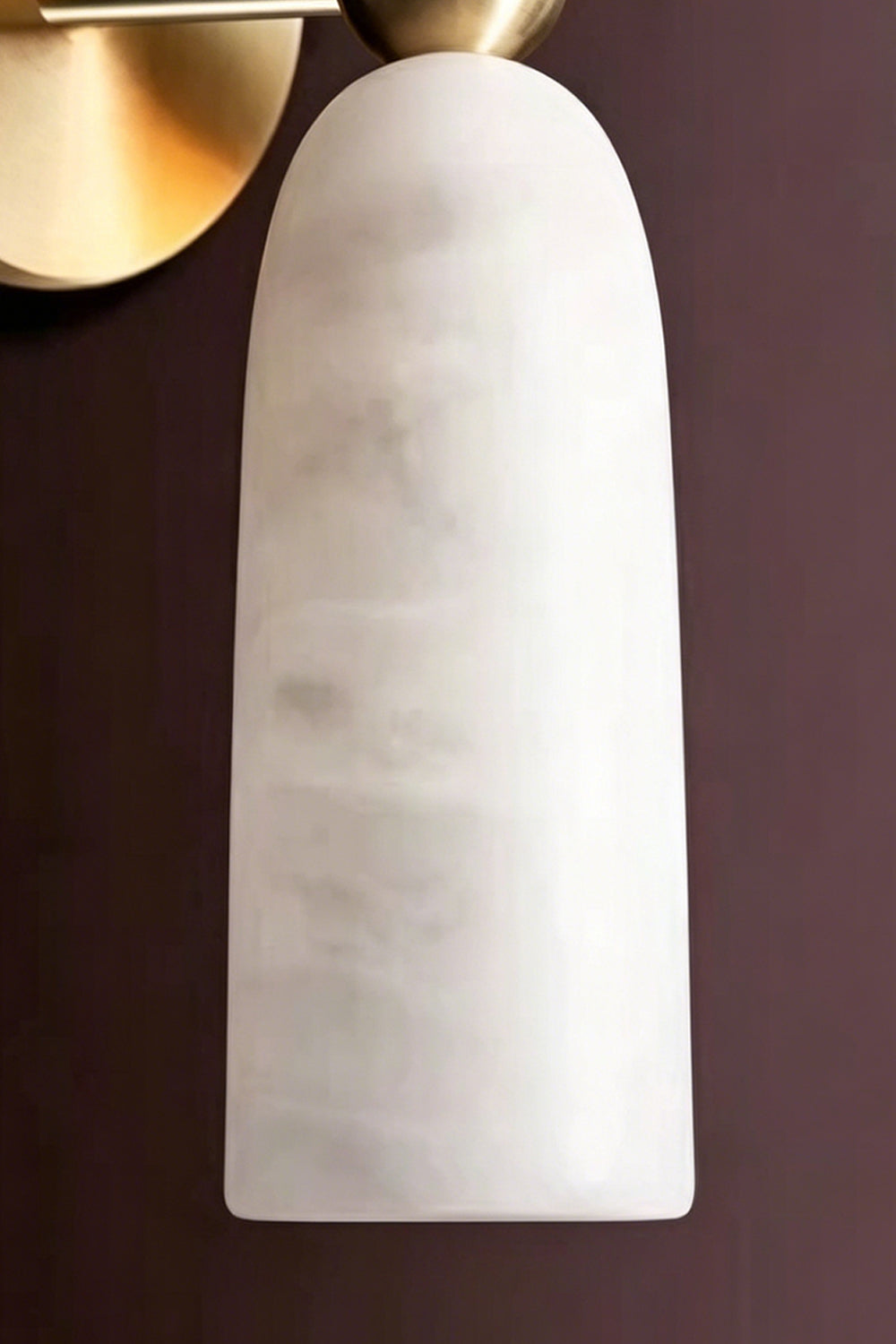 Vesperal Axis Alabaster Wall Lamp | Alabaster, Metal | Detailed macro view of the carved alabaster shade showing organic veining and smooth finish | Detail shot | Samu Lamp