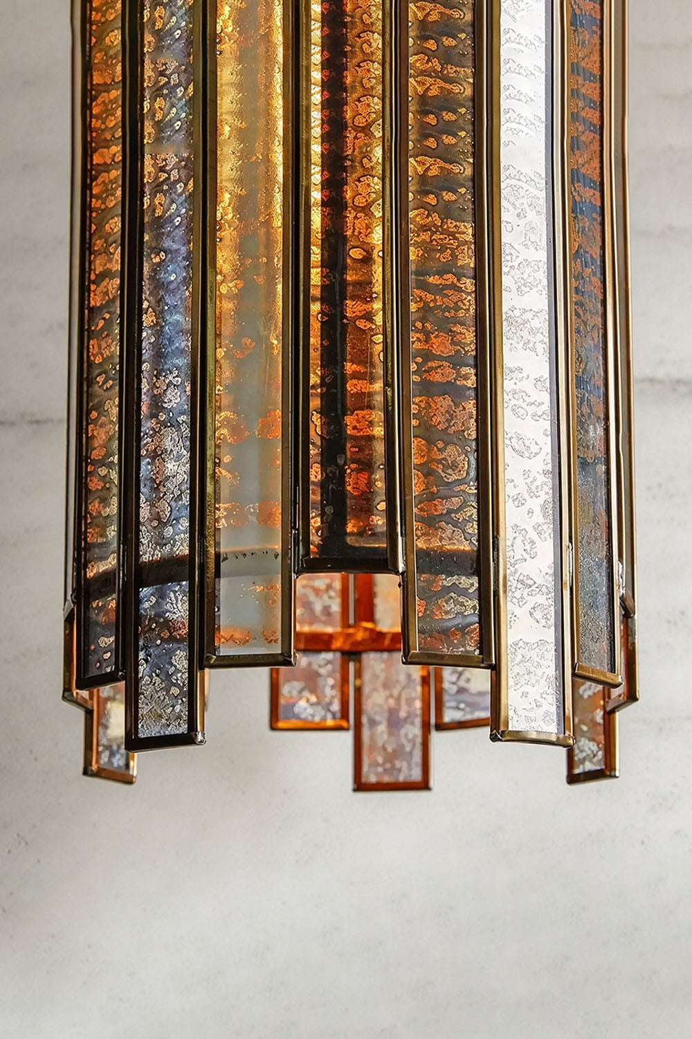 Vitrelle Cylinder Pendant | Textured Glass and Bronze | Macro view of fluted glass panels and staggered bottom | Samu Lamp