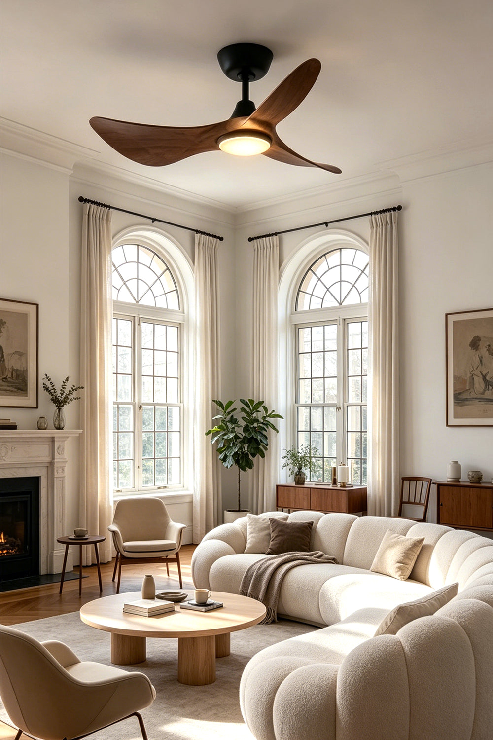 Volant Sculptural Wood Ceiling Fan Light | Wood, Metal | Installed as functional overhead statement lighting in a bright luxury living room featuring high arched windows, a cream curved sofa, and classical decor | Samu Lamp