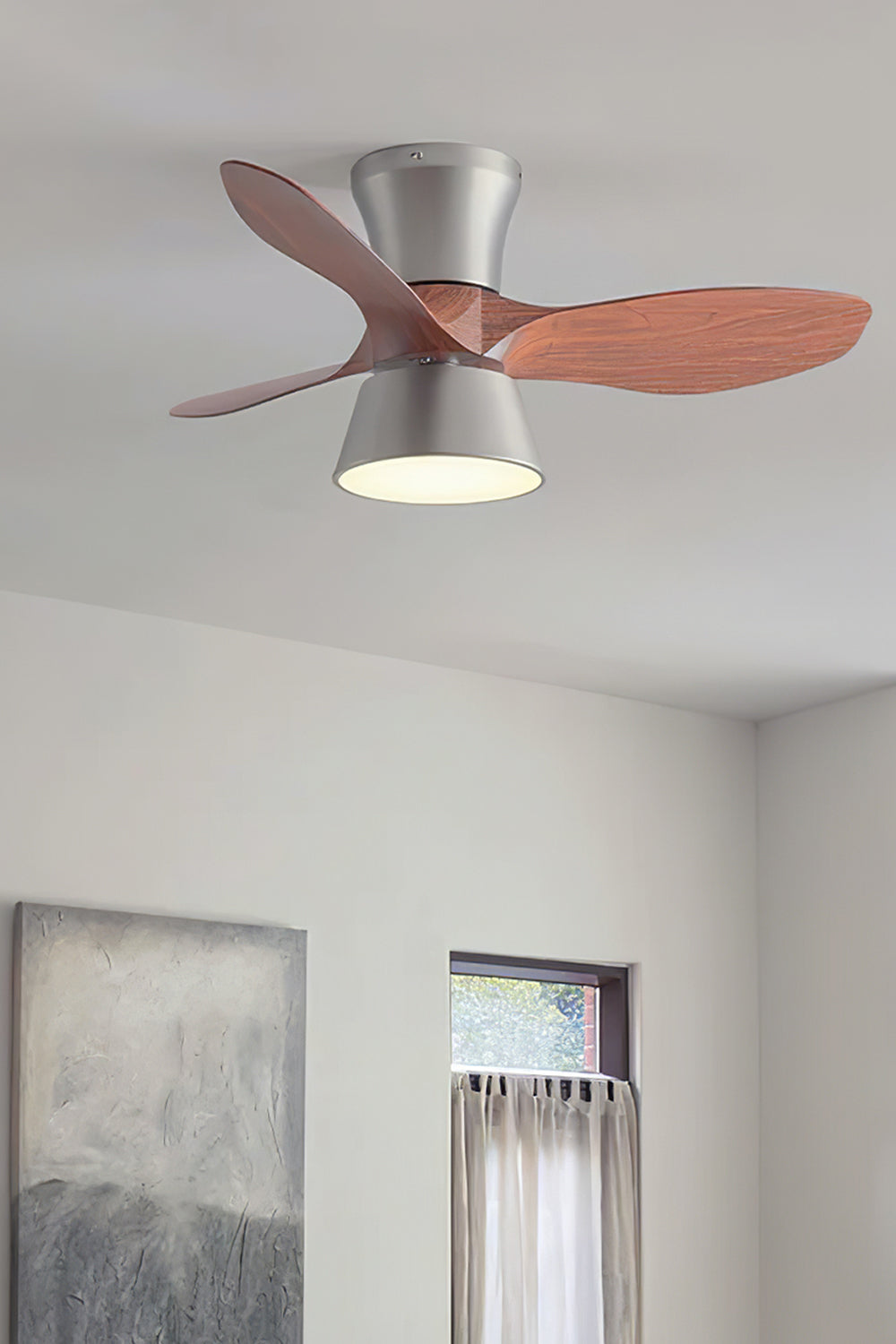 Volos Modern Minimalist Ceiling Fan Light | Wood, Metal | Installed flush against a high white ceiling in a clean, contemporary room with tall windows and abstract wall art | Samu Lamp