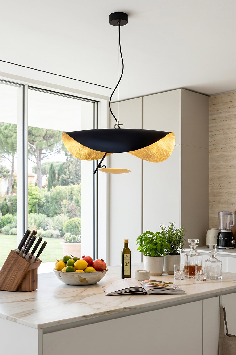 Voluta Horizon Metal Pendant Light | Metal | Black wave pendant light hanging as central lighting over a modern white kitchen island | Samu Lamp