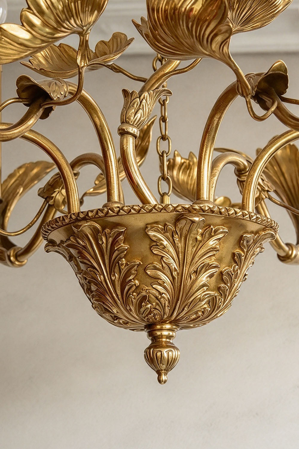 Vrilette Brass Leaf Vine Candle Chandelier | Carved Brass | Close-up view of the carved brass bowl base and curving candle arms | Samu Lamp