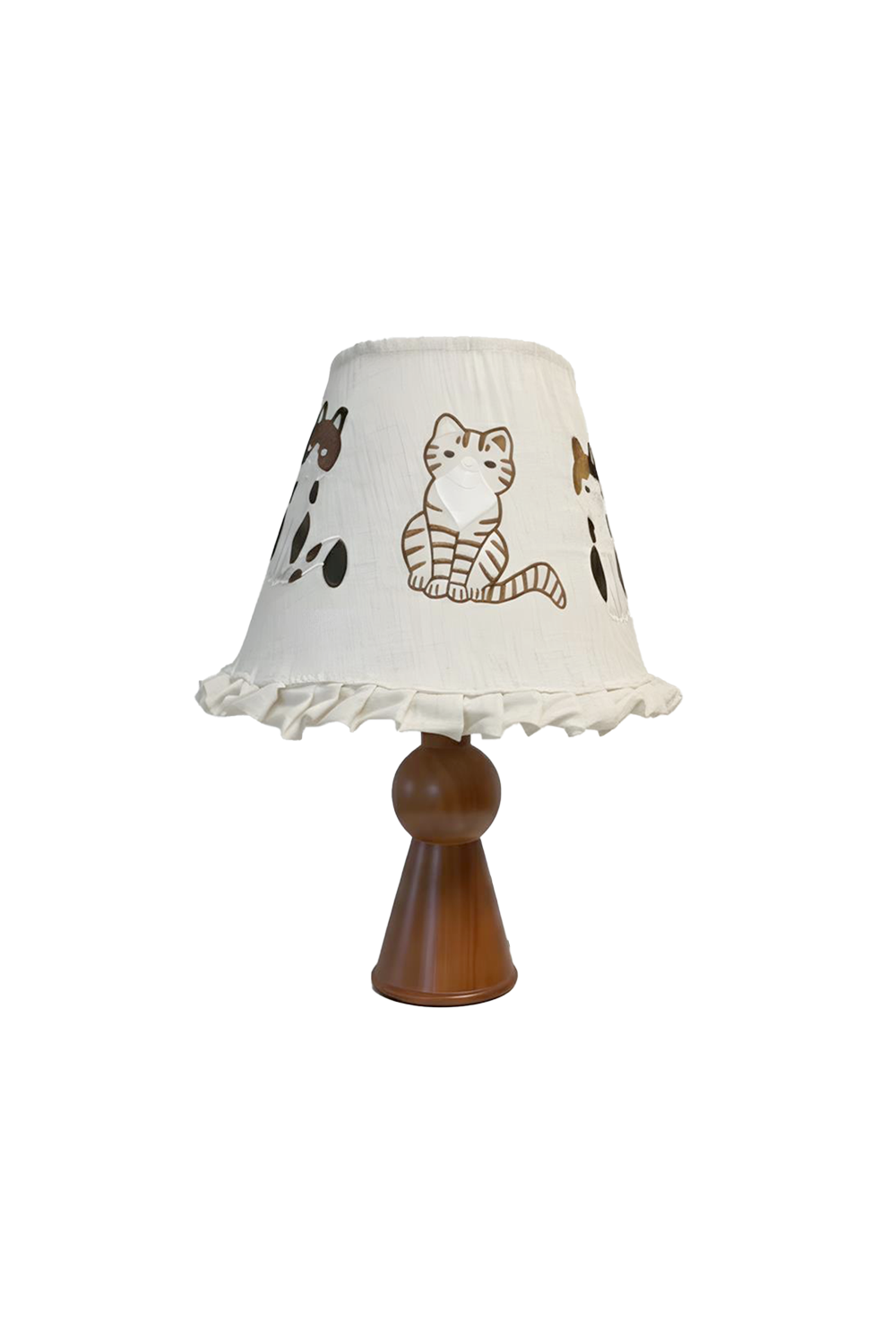 Whiskers Ruffled Fabric Table Lamp | Fabric, Wood | Whimsical table lamp featuring a white ruffled linen lampshade embroidered with cute cartoon cats and a sculpted hourglass warm brown wood base | Isolated lit product shot on white background | Samu Lamp