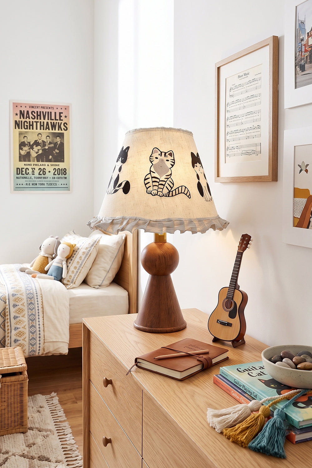 Whiskers Ruffled Fabric Table Lamp | Fabric, Wood | Styled in a bohemian kid's bedroom on a wooden dresser next to a bed with patterned bedding and an acoustic guitar | Samu Lamp