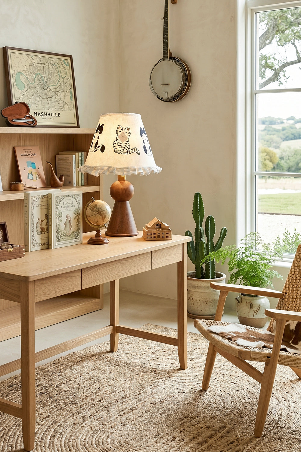 Whiskers Ruffled Fabric Table Lamp | Fabric, Wood | Positioned as a playful desk light on a minimalist wood writing table over a woven jute rug | Samu Lamp