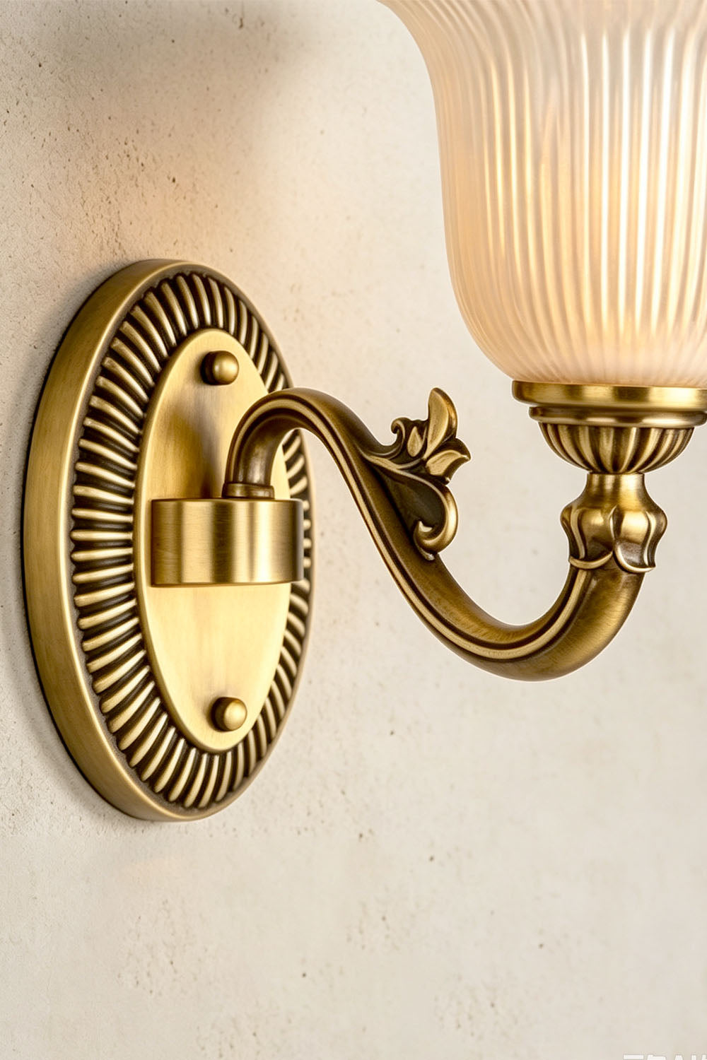 Whitlock Fluted Bell Brass Wall Lamp detail showcasing the elegant design and finish.