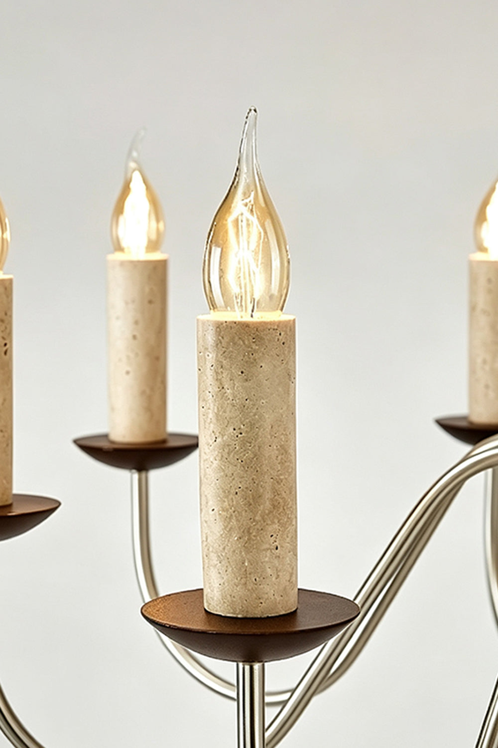 Winslow Travertine Candelabra Chandelier | Natural Travertine and Metal | Close-up view of the candle sleeves made of travertine stone | Samu Lamp